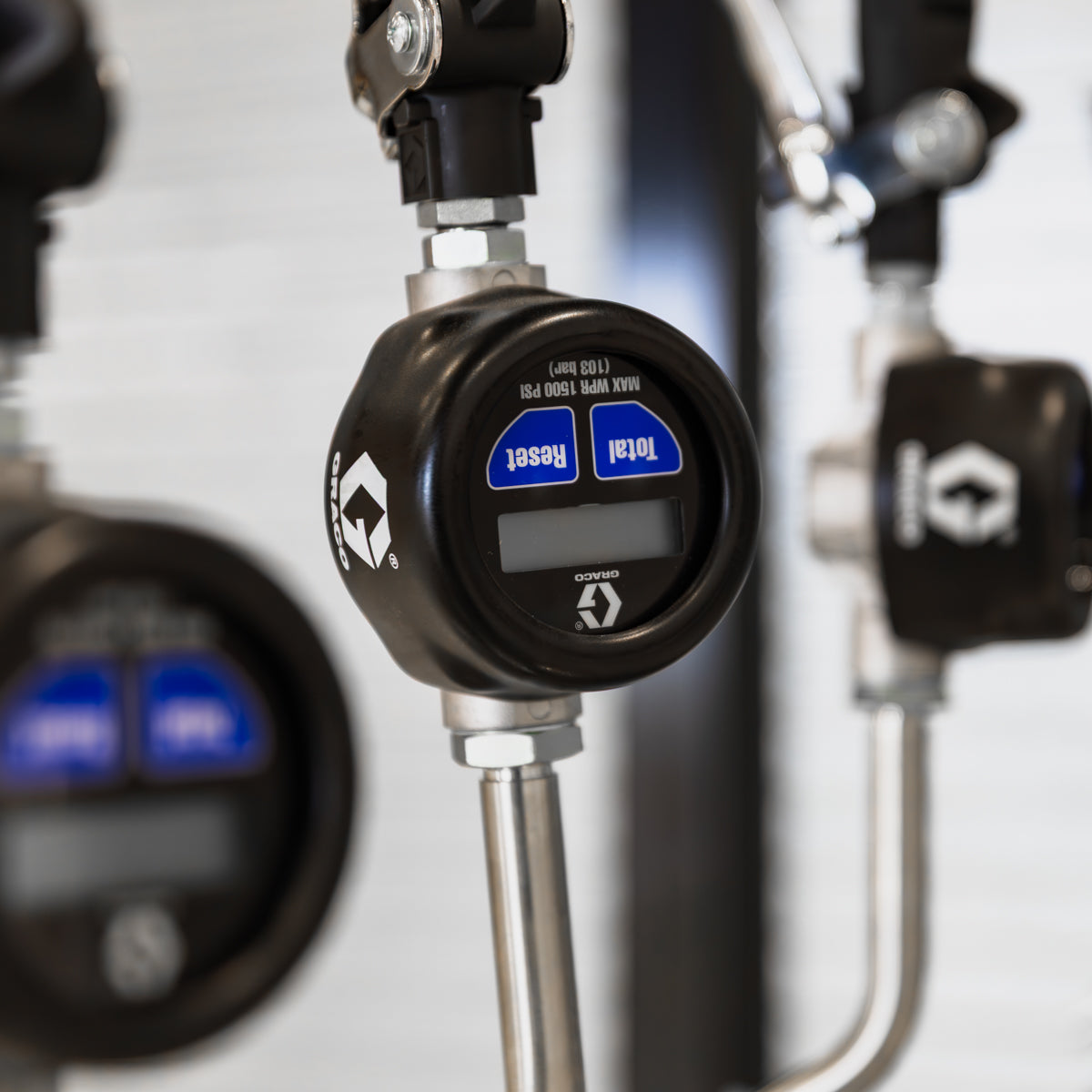 Graco Flow dispensing Meter installed on nozzle