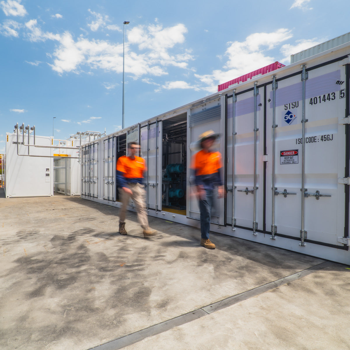 GO Employees on site with GO DG Store pump container